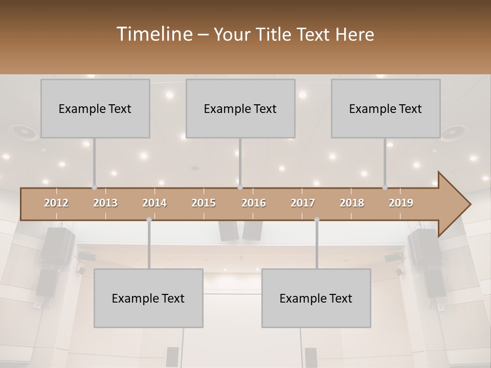 A Large Auditorium With Speakers And Lights On The Ceiling PowerPoint Template