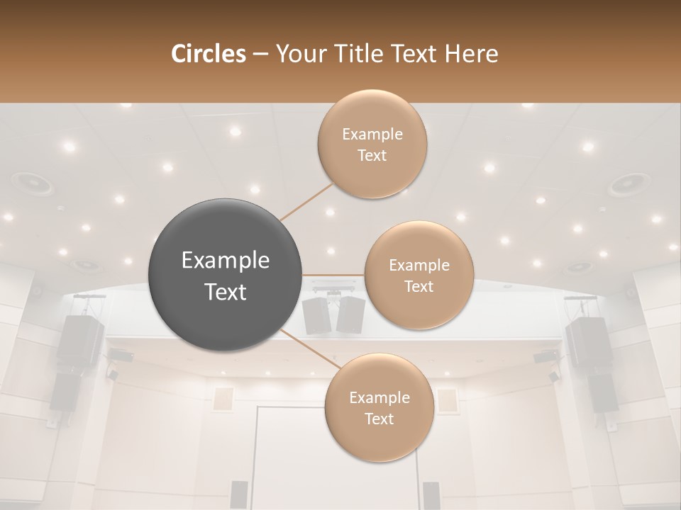 A Large Auditorium With Speakers And Lights On The Ceiling PowerPoint Template