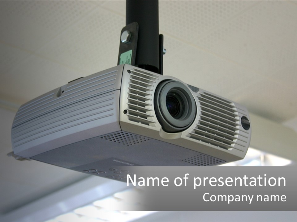 A Video Camera Hanging From The Ceiling Of A Building PowerPoint Template