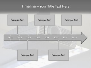 A Video Camera Hanging From The Ceiling Of A Building PowerPoint Template