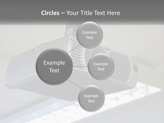 A Video Camera Hanging From The Ceiling Of A Building PowerPoint Template