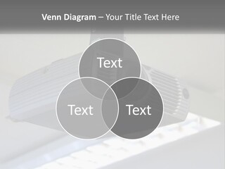 A Video Camera Hanging From The Ceiling Of A Building PowerPoint Template