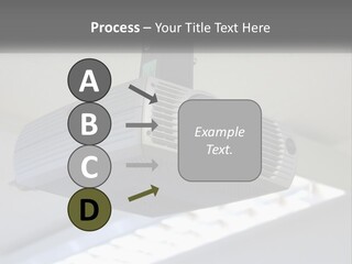 A Video Camera Hanging From The Ceiling Of A Building PowerPoint Template
