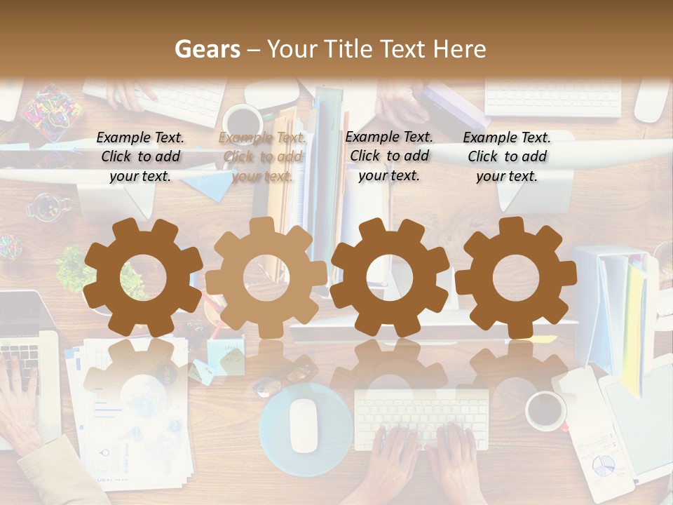 A Group Of People Sitting At A Table Working On Laptops PowerPoint Template