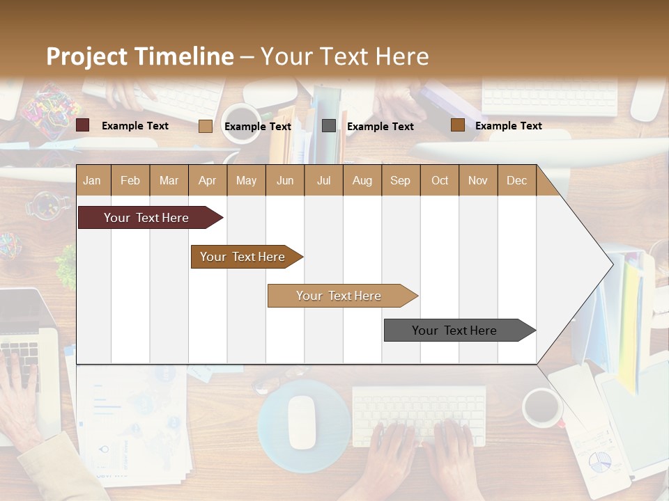 A Group Of People Sitting At A Table Working On Laptops PowerPoint Template