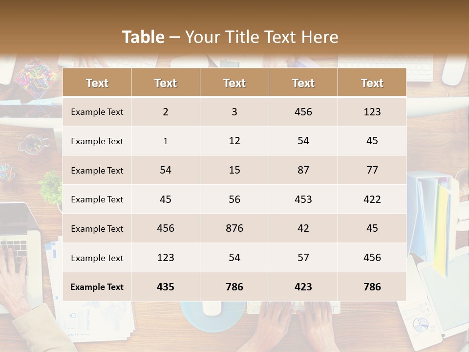 A Group Of People Sitting At A Table Working On Laptops PowerPoint Template