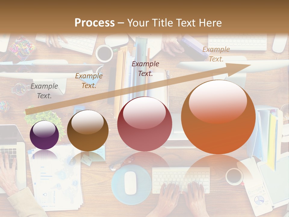 A Group Of People Sitting At A Table Working On Laptops PowerPoint Template