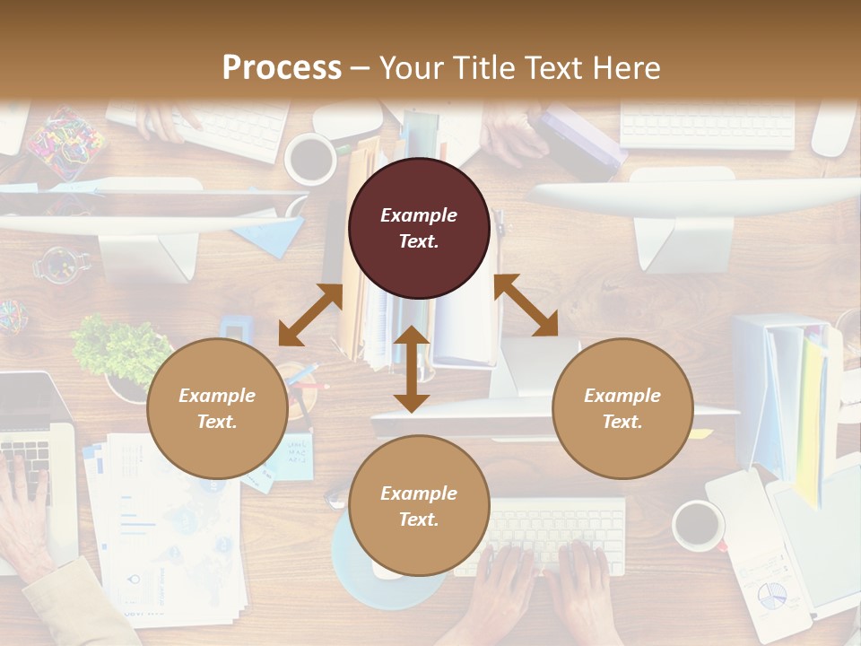A Group Of People Sitting At A Table Working On Laptops PowerPoint Template