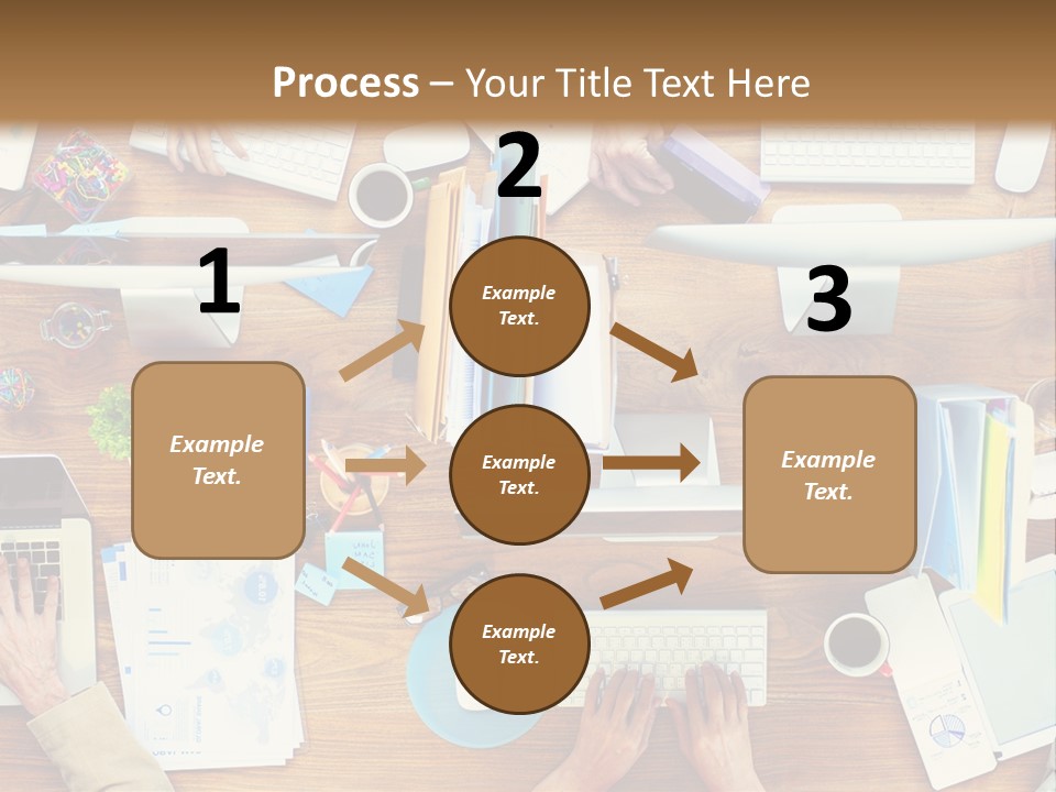 A Group Of People Sitting At A Table Working On Laptops PowerPoint Template