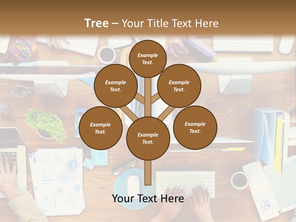 A Group Of People Sitting At A Table Working On Laptops PowerPoint Template