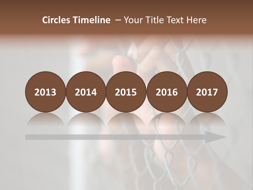 A Person Holding A Chain Link Fence With Their Hands PowerPoint Template