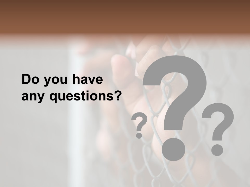A Person Holding A Chain Link Fence With Their Hands PowerPoint Template
