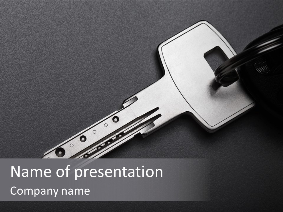 A Key With A Keychain On Top Of It PowerPoint Template