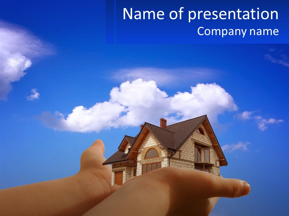 A Hand Holding A Small House In Front Of A Blue Sky PowerPoint Template