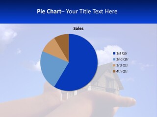 A Hand Holding A Small House In Front Of A Blue Sky PowerPoint Template