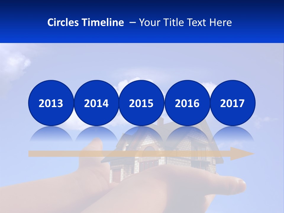 A Hand Holding A Small House In Front Of A Blue Sky PowerPoint Template