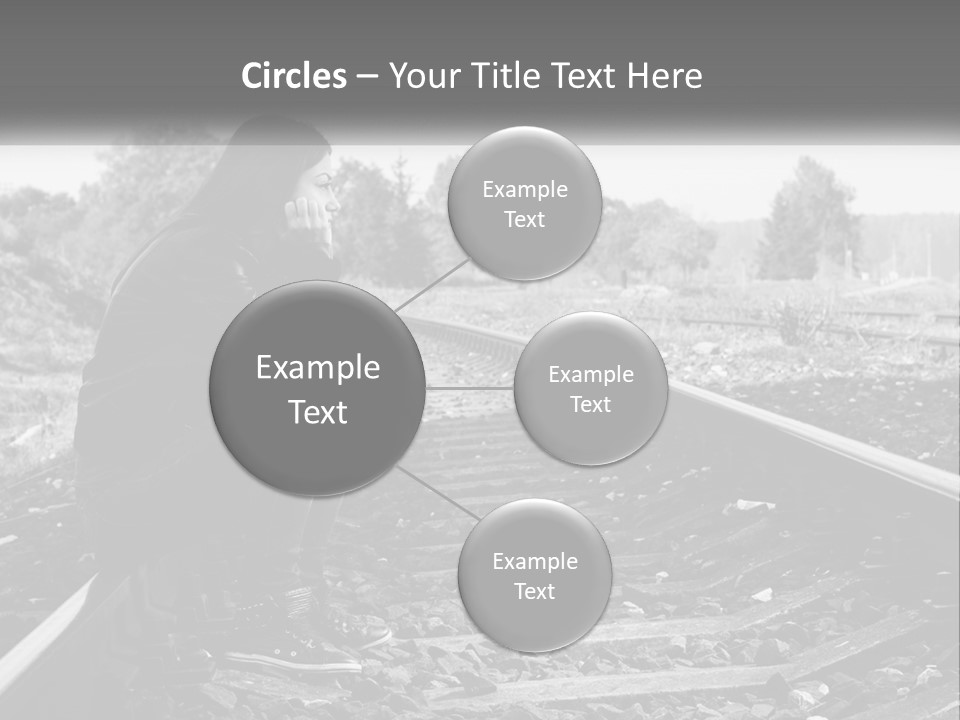 A Woman Sitting On A Train Track In Black And White PowerPoint Template