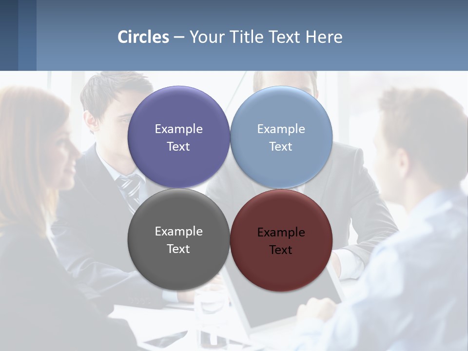 A Group Of Business People Sitting Around A Table PowerPoint Template