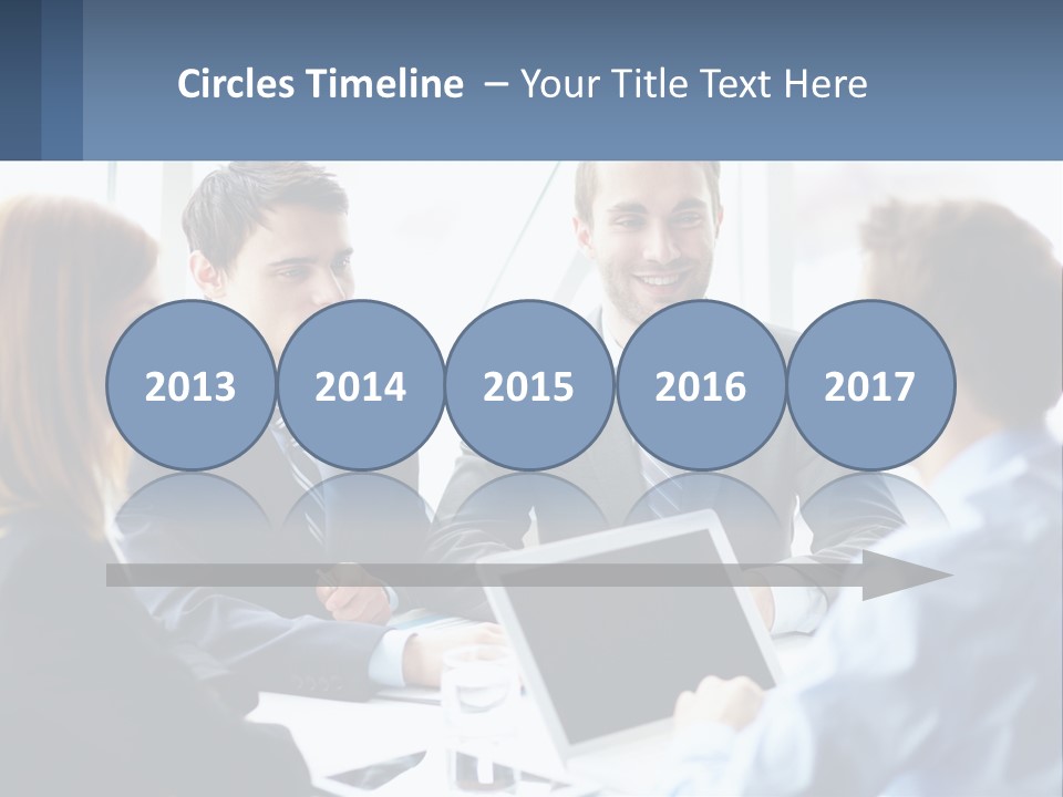 A Group Of Business People Sitting Around A Table PowerPoint Template