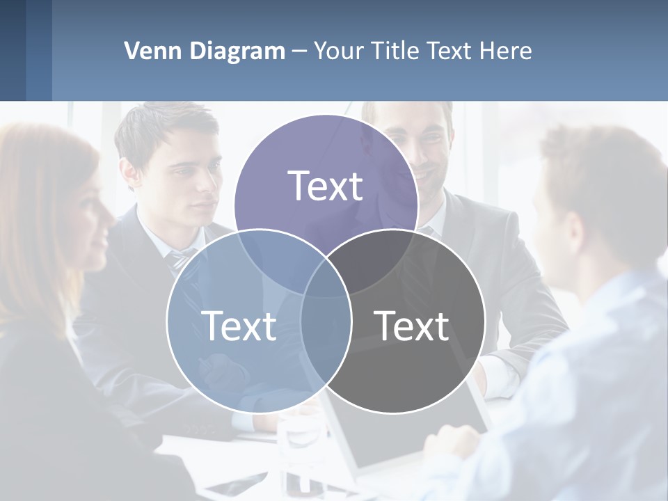 A Group Of Business People Sitting Around A Table PowerPoint Template