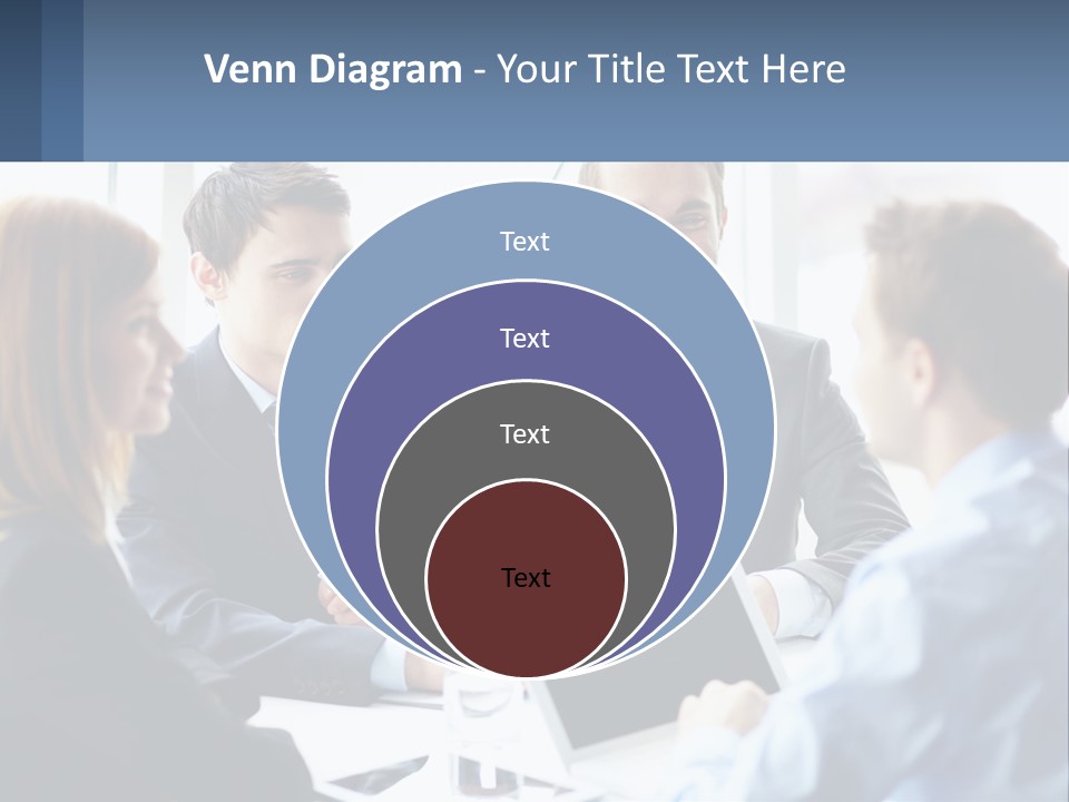 A Group Of Business People Sitting Around A Table PowerPoint Template