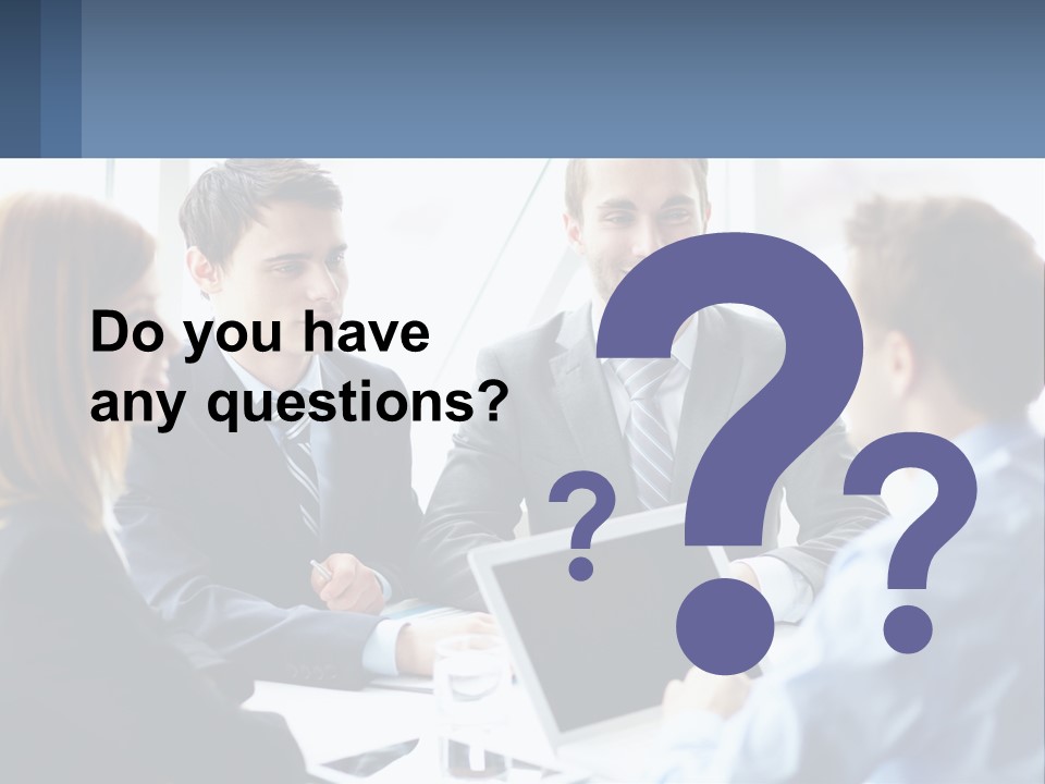 A Group Of Business People Sitting Around A Table PowerPoint Template