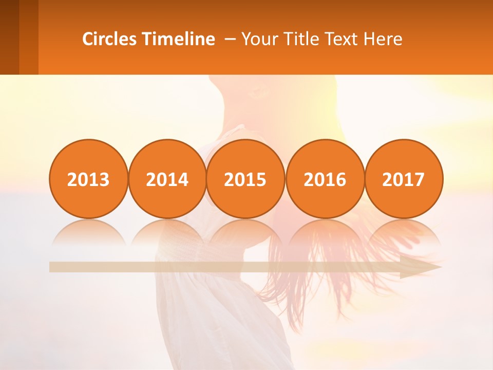 A Woman Standing On The Beach With Her Arms Outstretched PowerPoint Template