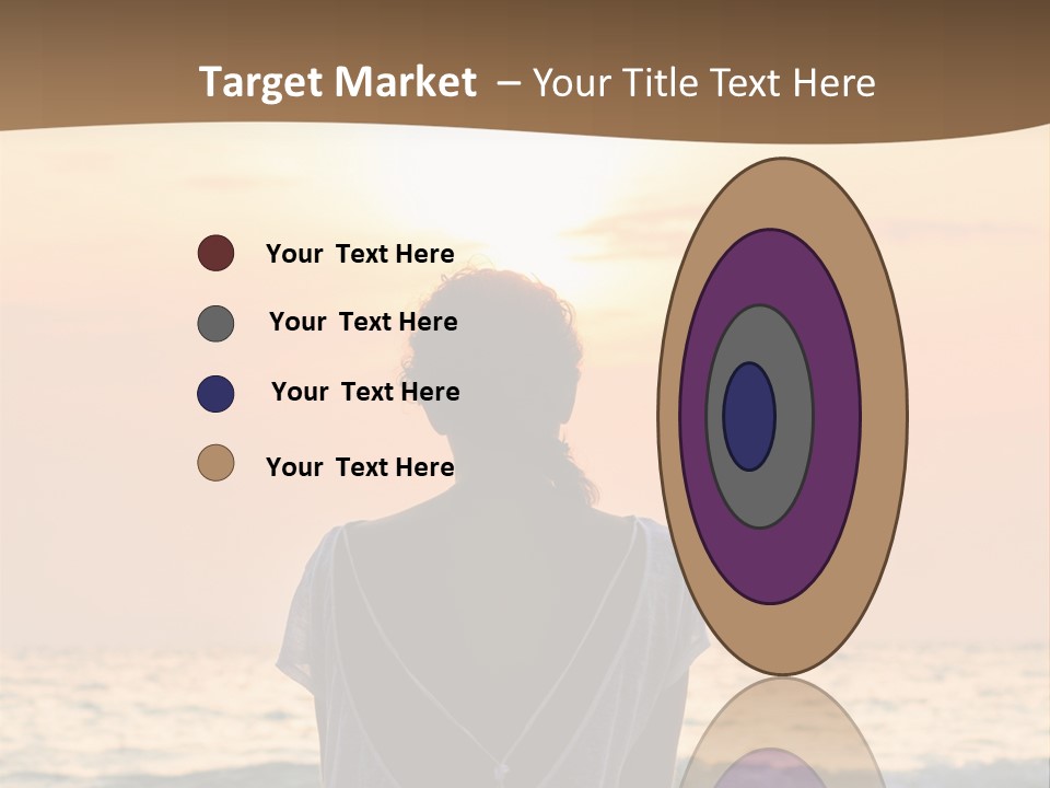 A Woman Sitting On The Beach At Sunset Powerpoint Template PowerPoint Template
