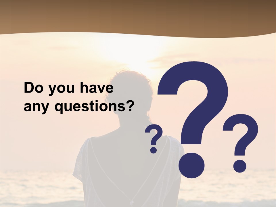 A Woman Sitting On The Beach At Sunset Powerpoint Template PowerPoint Template