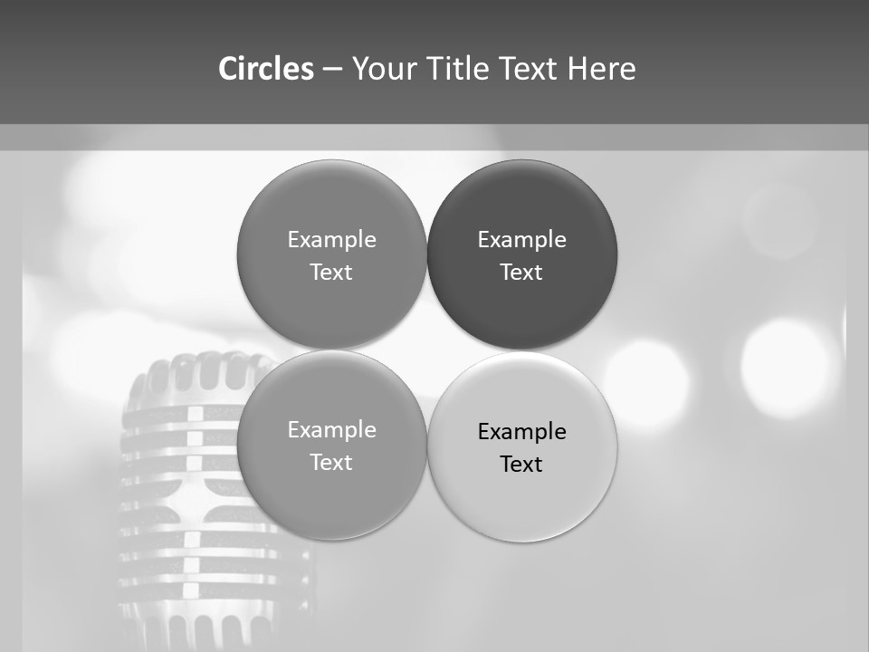 A Black And White Photo Of A Microphone PowerPoint Template