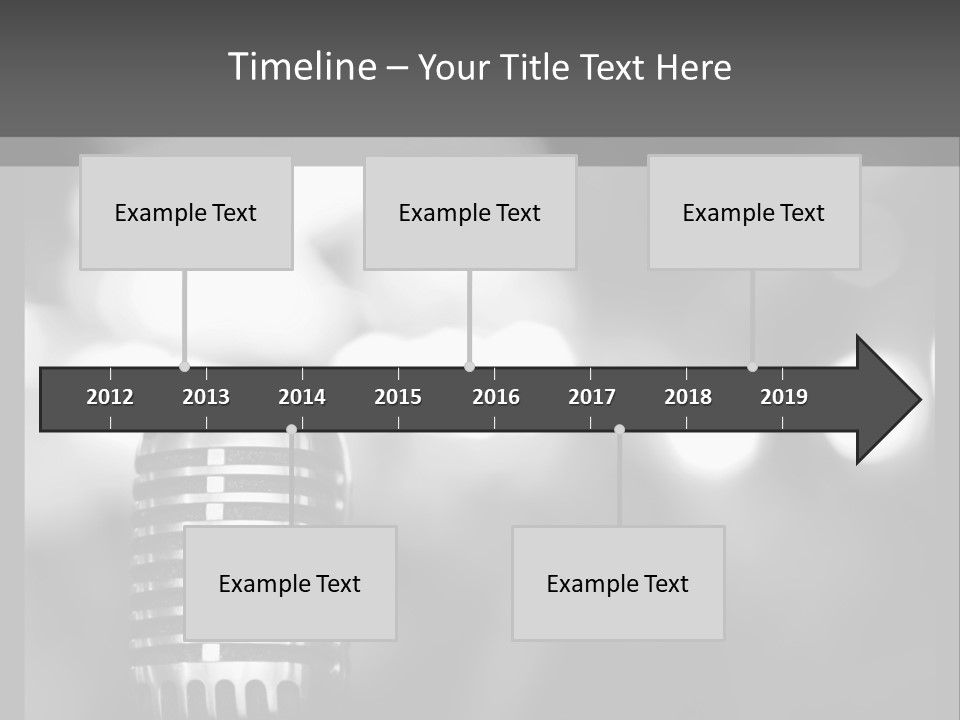 A Black And White Photo Of A Microphone PowerPoint Template