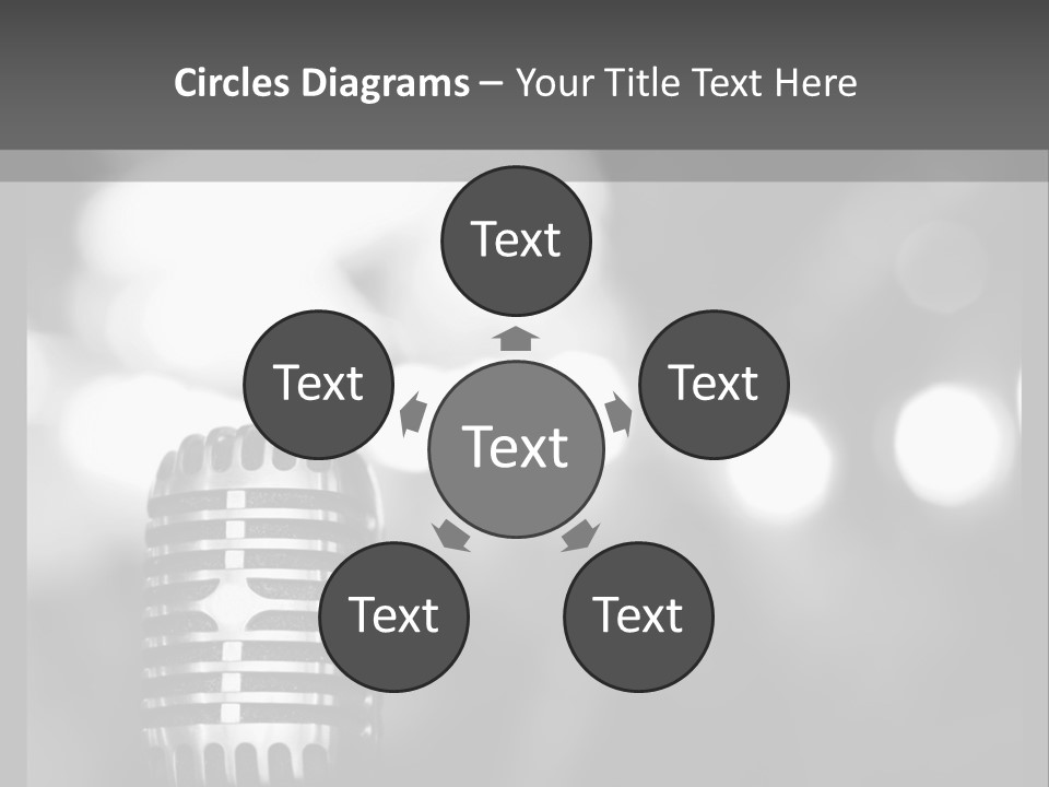 A Black And White Photo Of A Microphone PowerPoint Template