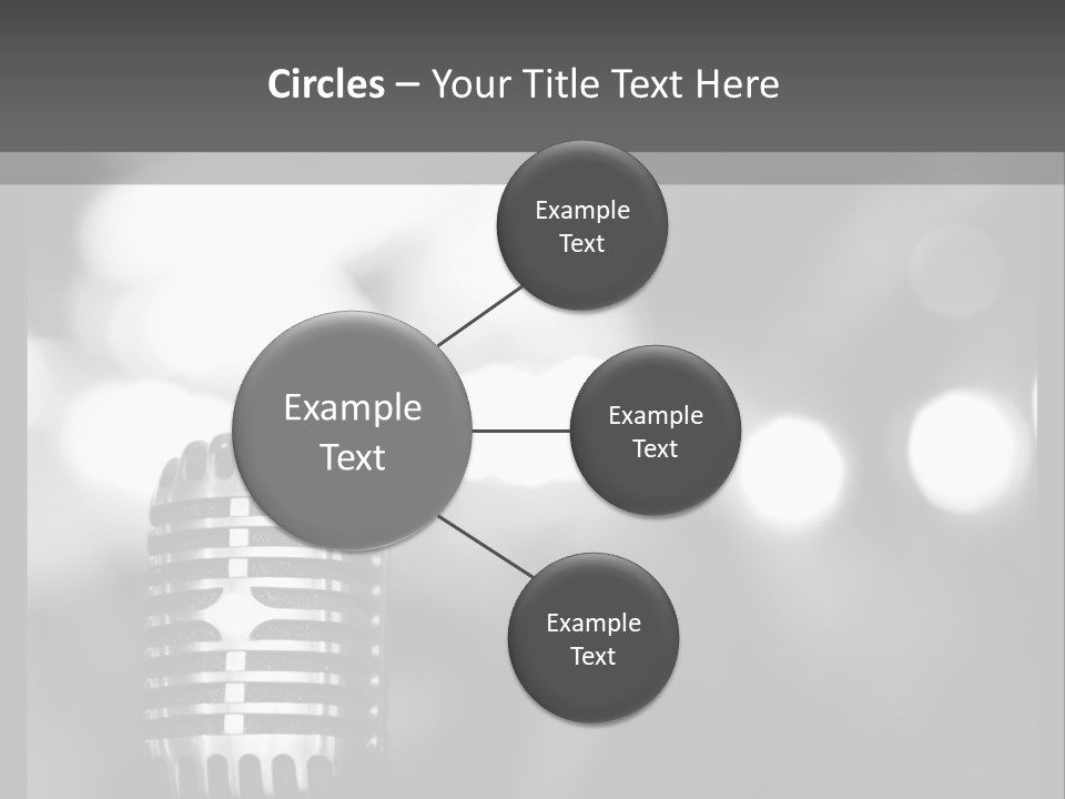 A Black And White Photo Of A Microphone PowerPoint Template