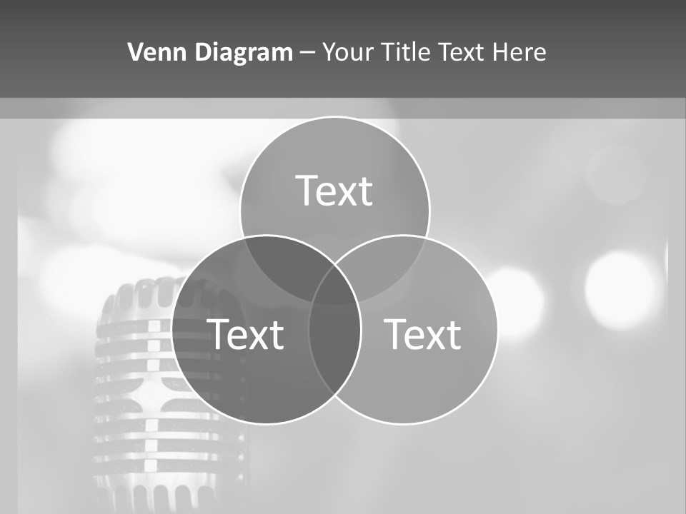 A Black And White Photo Of A Microphone PowerPoint Template