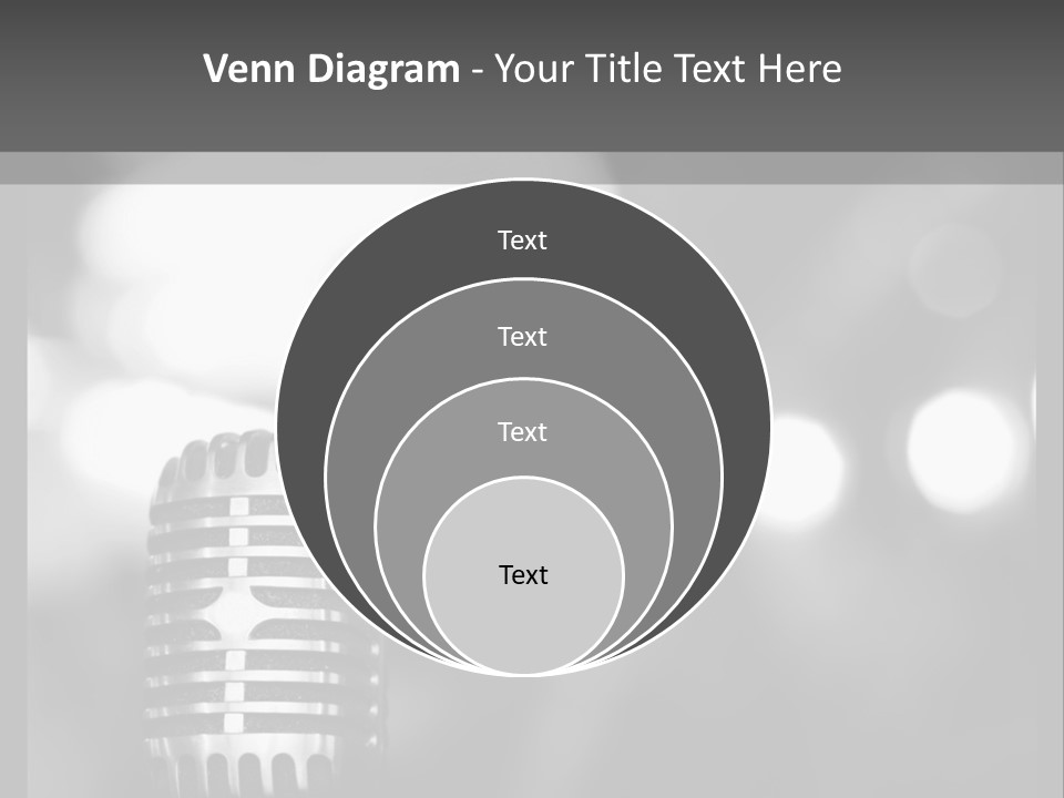 A Black And White Photo Of A Microphone PowerPoint Template