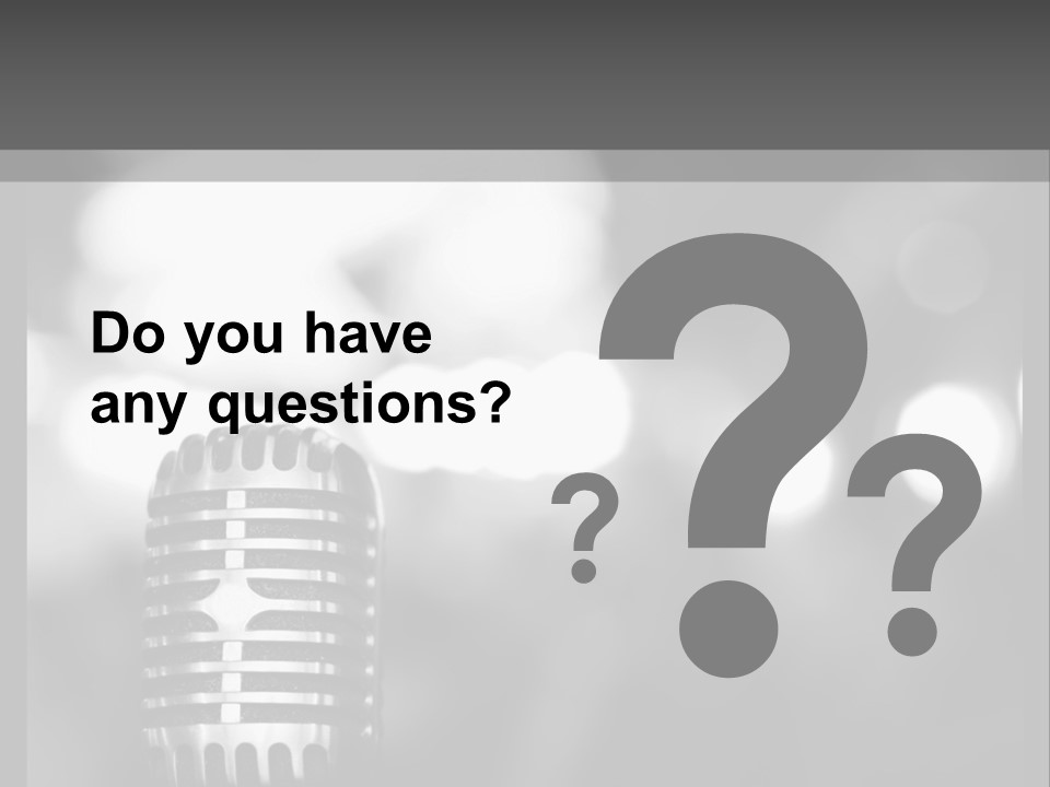 A Black And White Photo Of A Microphone PowerPoint Template