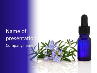 A Bottle Of Essential Oils Next To Some Flowers PowerPoint Template