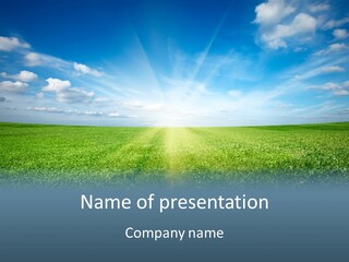 A Green Field With A Bright Blue Sky In The Background PowerPoint Template