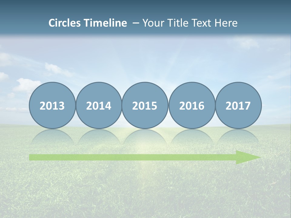 A Green Field With A Bright Blue Sky In The Background PowerPoint Template