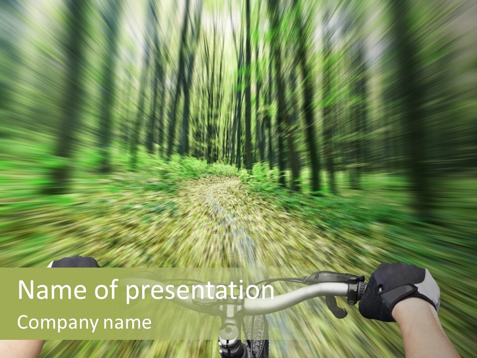 A Person Riding A Bike Through A Forest PowerPoint Template