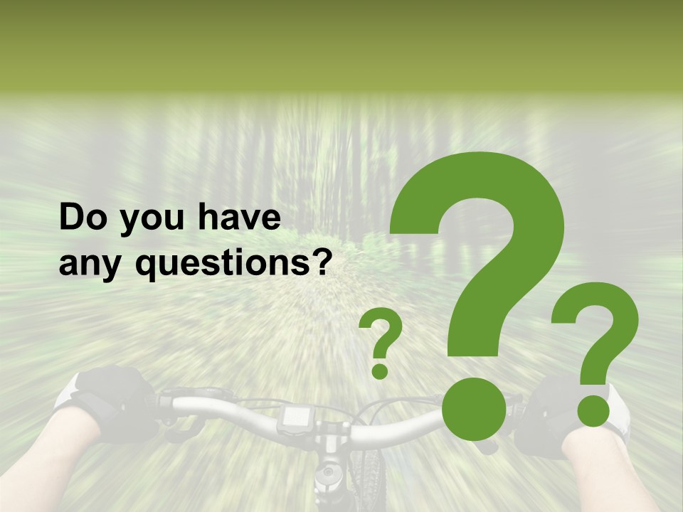 A Person Riding A Bike Through A Forest PowerPoint Template