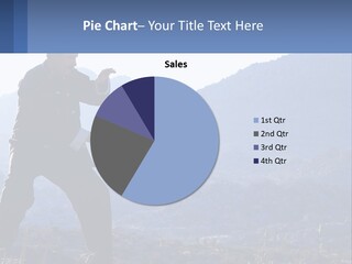 A Man Standing On Top Of A Mountain Pointing At Something PowerPoint Template