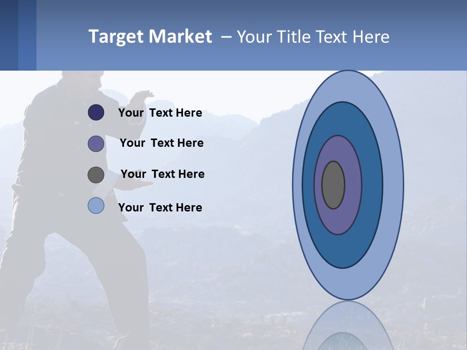 A Man Standing On Top Of A Mountain Pointing At Something PowerPoint Template