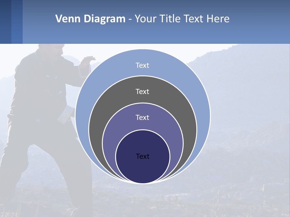 A Man Standing On Top Of A Mountain Pointing At Something PowerPoint Template