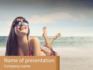 A Woman Laying On The Beach With Sunglasses On Her Head PowerPoint Template