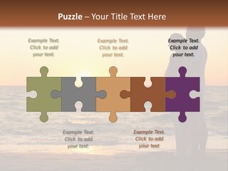 Two People Standing On A Beach At Sunset PowerPoint Template
