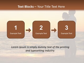 Two People Standing On A Beach At Sunset PowerPoint Template