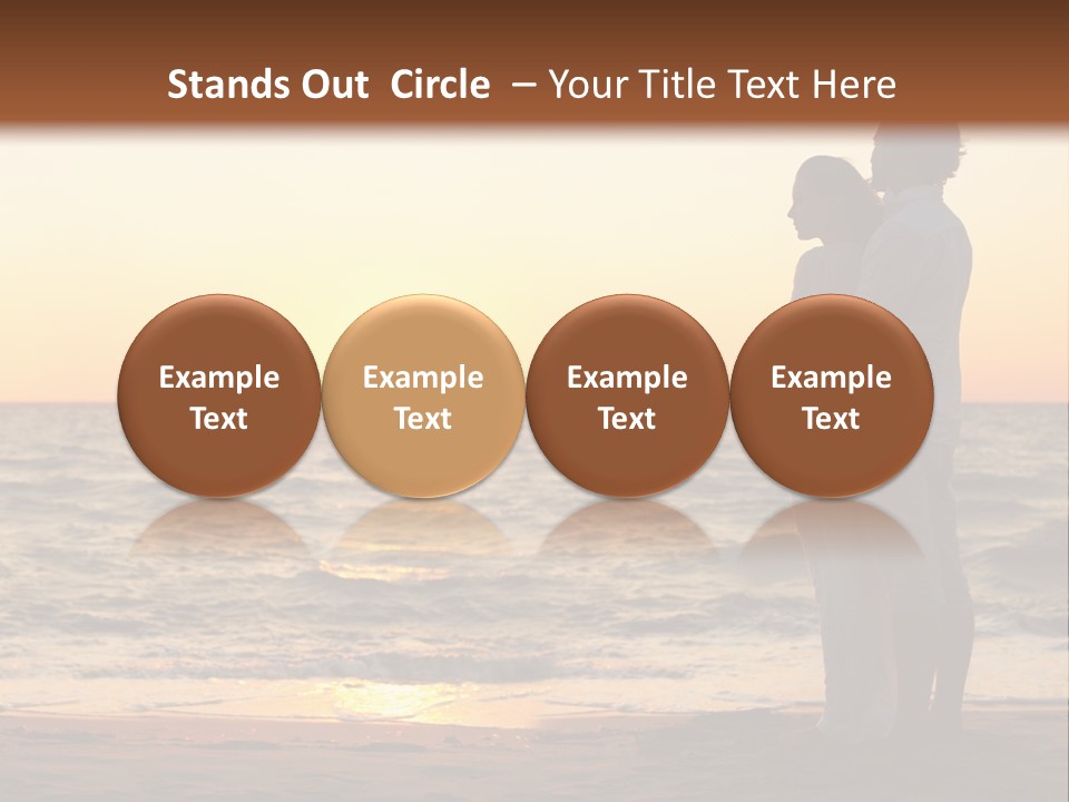 Two People Standing On A Beach At Sunset PowerPoint Template