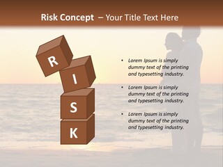 Two People Standing On A Beach At Sunset PowerPoint Template