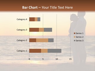 Two People Standing On A Beach At Sunset PowerPoint Template
